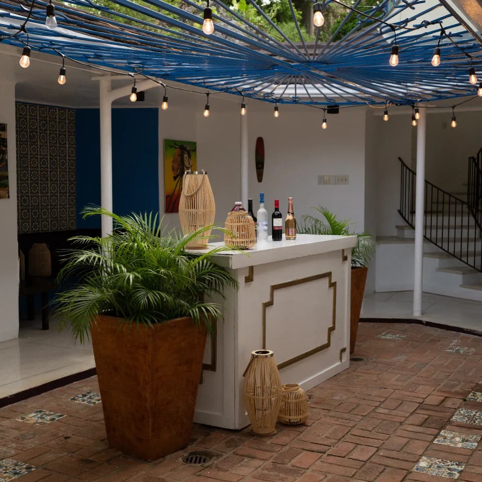 The courtyard at Bay Vista Villa set up as a bar, with string lights overhead